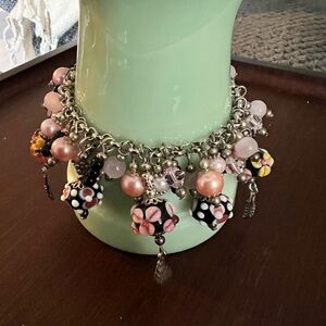 Vintage Charmed pink bracelet cha cha style. Silver tone, faux pearls,
Lamp work